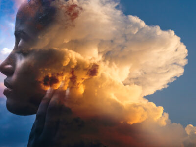 photo of woman, head in clouds; dream concept