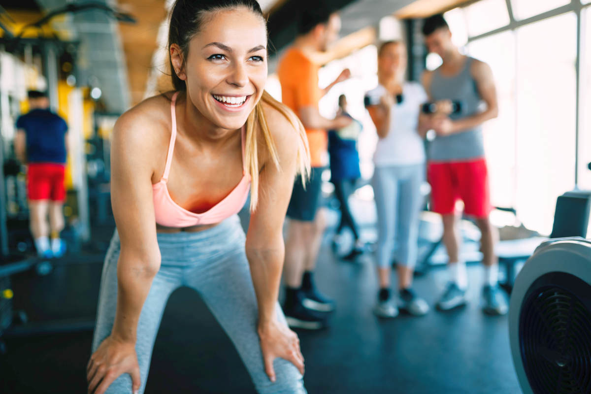 Close up image of attractive fit woman in gym | Can Too Much Protein Cause Inflammation?