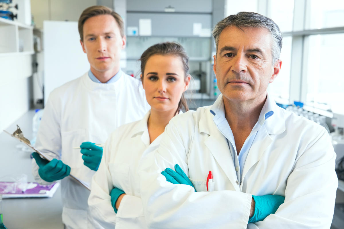 Team of scientists working together at the laboratory 