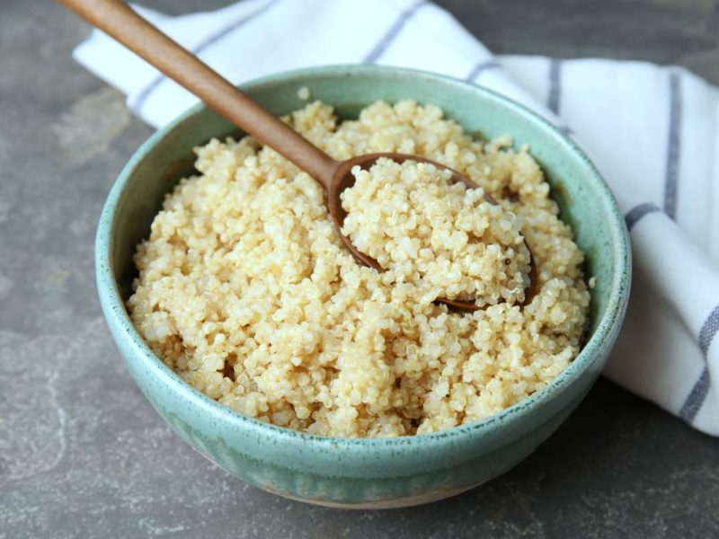 Bowl of cooked quinoa on a table