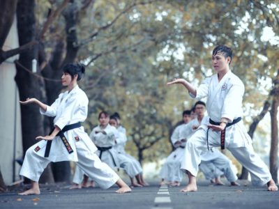 image of people doing karate on the road