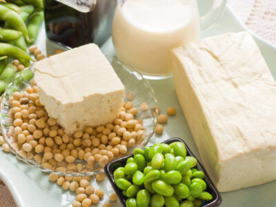 photo of soy in different forms - soy beans, tofu, edamame, soy milk
