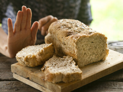 photo of person with celiac disease refusing bread