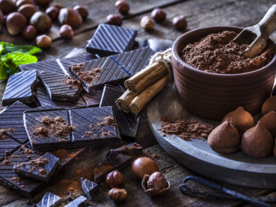 chocolate, cocoa, cacao, spread out on a table representing the health benefits of chocolate