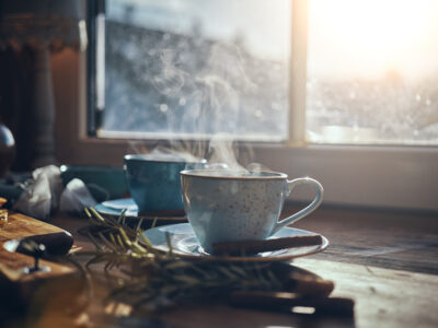 Hot Fruit Tea with Oranges and Cinnamon next to window